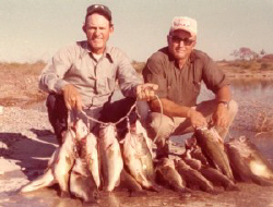 Gene Christian and Bill Grissom team up to catch a load of Big Black Bass